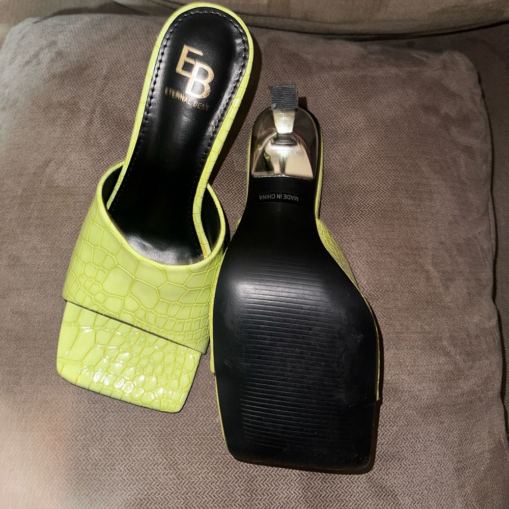 Square shaped green heels